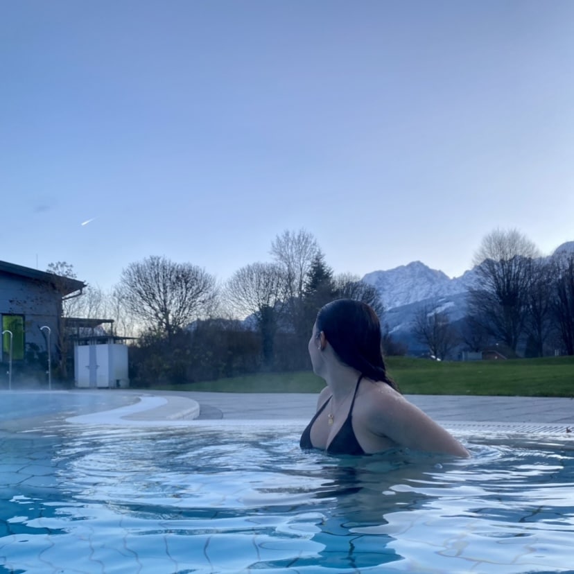 Outdoor pool in the centre with mountain views.
